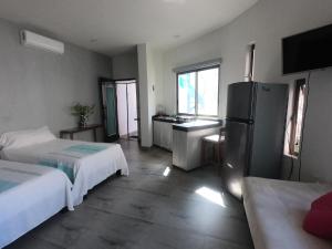 Postel nebo postele na pokoji v ubytování Casa Arbol de Paz habitación doble + 15 fotografií