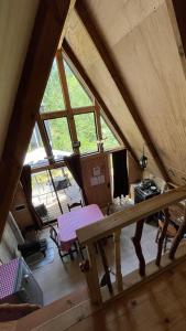 an overhead view of a room in an attic at Refugio de bosque altos de ñancul in Panguipulli