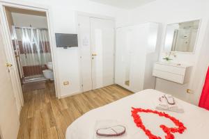 A bed or beds in a room at Isa Sweet Home