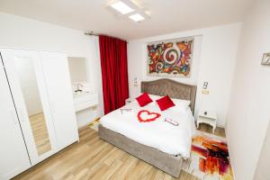 A bed or beds in a room at Isa Sweet Home