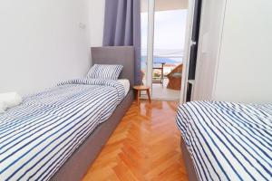 En eller flere senge i et værelse på House Rosemary + 30 billeder