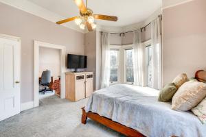 a bedroom with a bed and a ceiling fan at Stylish Sacramento Retreat Less Than 1 Mi to Downtown! in Sacramento