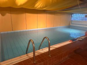 Kolam renang di atau dekat dengan Ferienanlage Bi de Süd 43 Ferienwohnung Kajüte 2-OG +7 gambar