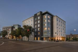 a building on the corner of a street at Fairfield Inn & Suites by Marriott Dayton in Dayton