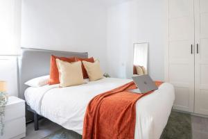Postel nebo postele na pokoji v ubytování Cozy apt, 20min downtown, Palacio Vista Alegre