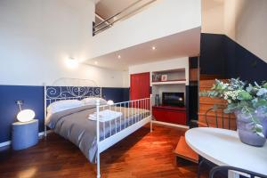 Postel nebo postele na pokoji v ubytování Salotto Borbonico