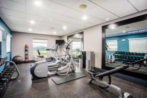 a fitness room with a gym with tread machines at Hampton Inn Elkins in Elkins