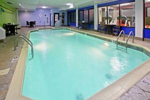 a large swimming pool with blue water at Hampton Inn Elizabethtown in Elizabethtown