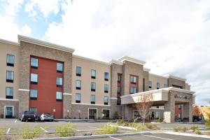 a rendering of a building with a parking lot at Hampton Inn Corning/Painted Post in Painted Post