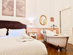 Postel nebo postele na pokoji v ubytování Macchiato Suites Boutique Guest House