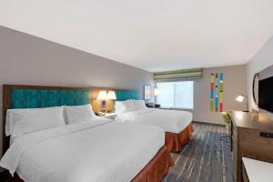 Postel nebo postele na pokoji v ubytování Hampton Inn Fort Collins