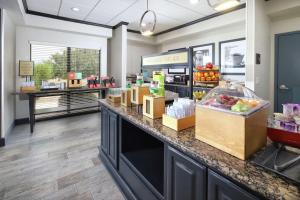 a store with a counter with fruit on it at Hampton Inn Sierra Vista in Sierra Vista