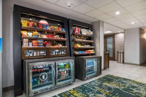 a lobby with two vending machines and drinks at Hampton Inn Gadsden in Gadsden