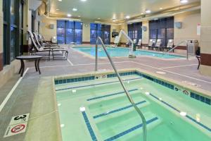 a large swimming pool in a hotel room at Hampton Inn & Suites Spokane Valley in Spokane Valley