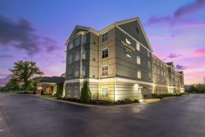 a rendering of a hotel with a parking lot at Homewood Suites by Hilton at Carolina Point - Greenville in Greenville