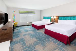 Postel nebo postele na pokoji v ubytování Hampton Inn and Suites Houston Heights I-10