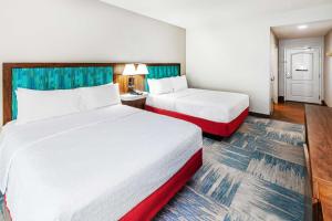 Postel nebo postele na pokoji v ubytování Hampton Inn and Suites Houston Heights I-10