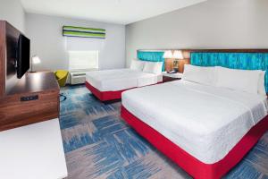 Postel nebo postele na pokoji v ubytování Hampton Inn and Suites Houston Heights I-10