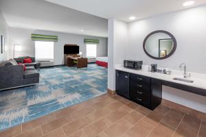 TV a/nebo společenská místnost v ubytování Hampton Inn and Suites Houston Heights I-10