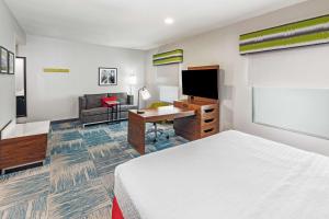 TV a/nebo společenská místnost v ubytování Hampton Inn and Suites Houston Heights I-10