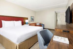 TV a/nebo společenská místnost v ubytování Hampton Inn Long Island/Islandia