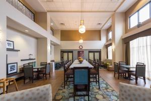 a large dining room with tables and chairs at Hampton Inn and Suites Jamestown in Jamestown