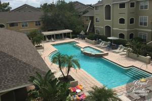 an overhead view of a swimming pool in a apartment complex at The Avalon in Clearwater