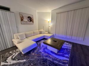 a living room with a couch and a coffee table at The Avalon in Clearwater