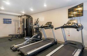 a gym with two tread machines in a room at The Avalon in Clearwater