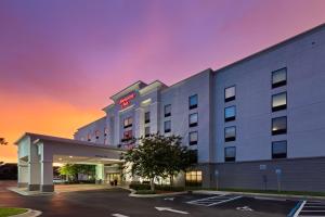 a rendering of a hotel with a parking lot at Hampton Inn Jacksonville-I-295 East/Baymeadows in Jacksonville