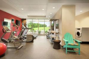 a fitness room with a gym with cardio equipment at Home2 Suites By Hilton Frederick in Frederick