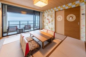 Voodi või voodid majutusasutuse Ryugujo Spa Hotel Mikazuki Fujimitei toas