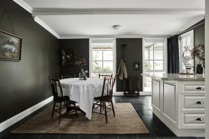 a kitchen and dining room with a table and chairs at Luxury Bendigo Stay in Golden Square +30 photos