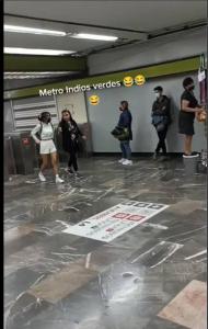 a group of people standing in a subway station at Habitación cómoda para tu estancia in Mexico City