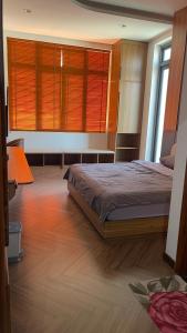 Postel nebo postele na pokoji v ubytování Twin Villa Đà Lạt