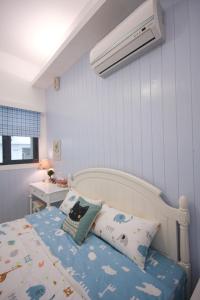 Katil atau katil-katil dalam bilik di Meet B&B