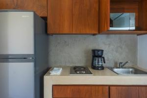 Kuchyň nebo kuchyňský kout v ubytování Casa Toloc Tulum