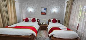 Katil atau katil-katil dalam bilik di Jungle Safari Lodge- Serenity in the Wild