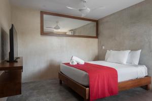 Postel nebo postele na pokoji v ubytování Casa Toloc Tulum