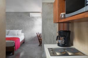 Postel nebo postele na pokoji v ubytování Casa Toloc Tulum