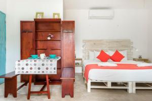 Postel nebo postele na pokoji v ubytování Casa Toloc Tulum