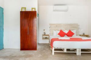 Postel nebo postele na pokoji v ubytování Casa Toloc Tulum