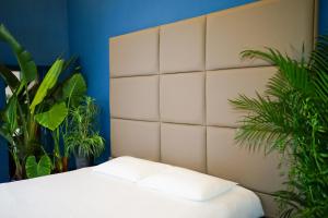 Postel nebo postele na pokoji v ubytování Valhalla Boutique Hotel