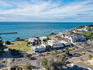 an aerial view of a town next to the ocean at Quarterdeck in Portsea