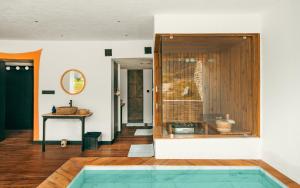 a room with a pool in the middle of a house at Shinta Mani Mustang - A Bensely Collection in Jomsom