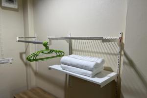 Postel nebo postele na pokoji v ubytování V Tharm Hotel + 37 fotografií