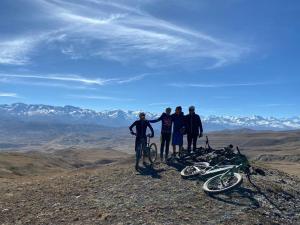 a group of people standing on top of a mountain at Shinta Mani Mustang in Jomsom
