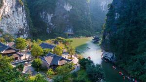 an aerial view of a river near a mountain at Hanoi EcoStay 1 hostel in Hanoi