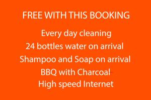 a poster with the words fire with this booking every day cleaning bottles water on at Villa Waree 5 minutes from Beach and Walking street in Pattaya South