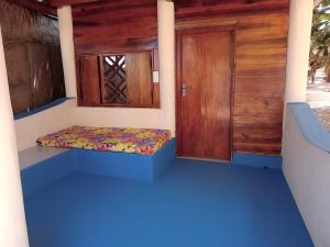 Postel nebo postele na pokoji v ubytování Breezy Beach Cabanas